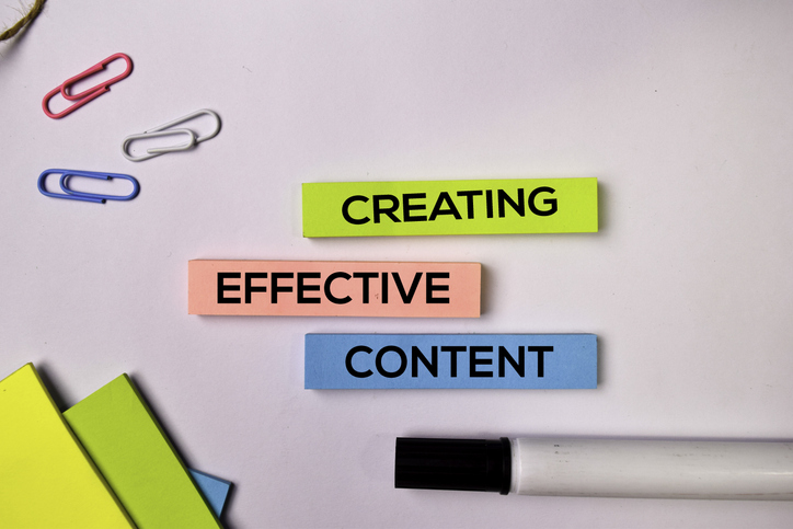 Creating Effective Content on sticky notes isolated on white background.
